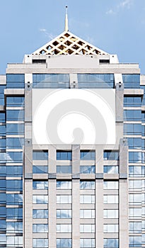 Mock up white large LED display horizontal billboard on tower building .clipping path for mockup