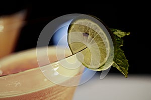Mocktail with Lime Slice and Peppermints leaf photo