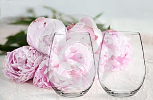 Mockup - 2 stemless wine glasses, with peonies behind