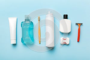 Mockup for bathing products top view flat lay, spa razor, toothpaste, soap, gel and other various accessories. Cosmetics