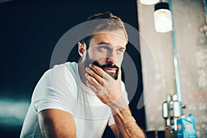 Mockup of a bearded man wearing white tshirt and