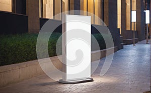 Mockup billboard. Blank white vertical advertising banners billboard stand on the sidewalk at night