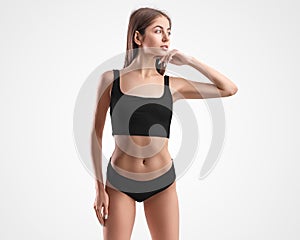 Mockup of black underwear, top and panties on the body of a young girl,  on the background