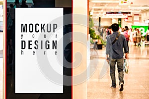 Mockup blank advertising billboard or advertising light box for your text message or media content inside building with blurred