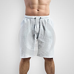 Mockup blank men`s shorts on a white background, front view