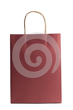 Mockup blank of paper shopping bag isolated on white background. Red color. Front view. Packet for gift or present.