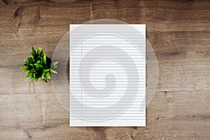 Mockup of blank white note papers on wooden background