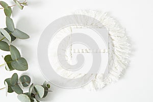 Mockup business card with eucalyptus leaves