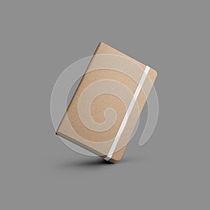 Mockup of closed craft notebook with white band, diagonal presentation, isolated on gray background