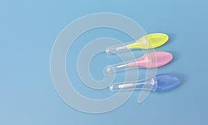 Mockup Colorful Interdental Toothbrush For Cleaning Between Teeth On Blue Background