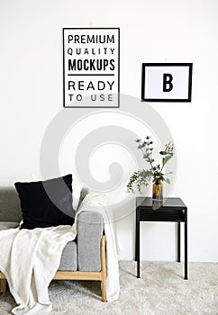 Mockup design space photo frame hanging on the wall photo