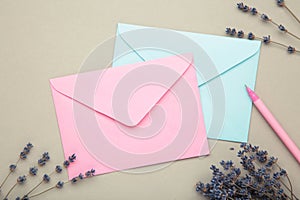 Mockup with envelopes and lavender on grey background