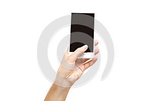 Mockup of female hand holding frameless cell phone with blank screen