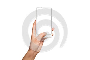 Mockup of female hand holding modern white cellphone with blank screen photo