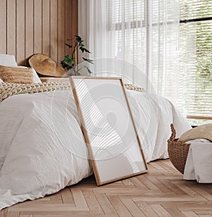Mockup frame in cozy bedroom interior background