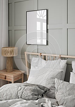 Mockup frame in cozy simple bedroom interior background