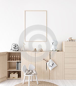 Mockup frame in minimal unisex child bedroom with natural wooden furniture