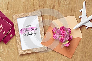 Mockup golden picture frame for travel with valentines day & love season background concept. Top view of mock up photo frame with