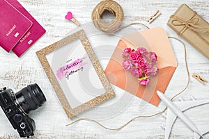 Mockup golden picture frame for travel with valentines day & love season background concept. Top view of mock up photo frame with