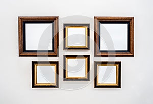 Mockup group of white blank spaces on six square painting art frames, or photography set with mounted.