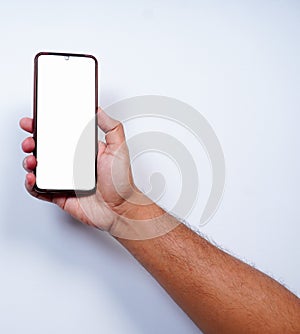 mockup handphone. Male hand holding black smartphone isolated on white background, road clipping