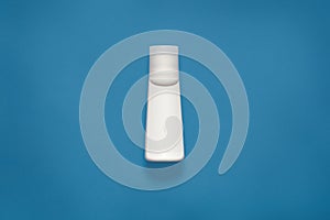 Mockup horizontal picture of white plastic bottle for liquids, cosmetic issues, situated in centre of photo, isolated over phantom