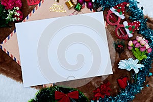 Mockup Image of a Blank White Greeting Card With Christmas Themed Decorations