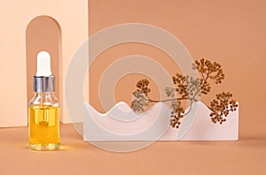 Mockup image of dropper bottle of organic cosmetics - polyglutamic or hyaluronic acid, serum, moisturizer or facial anti-aging oil