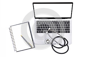 Mockup image of laptop computer with blank screen, e health, telehealth, telemedicine or medical network con medical stethoscope,