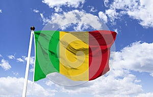 Mockup of Mali Flag fluttering under blue sky