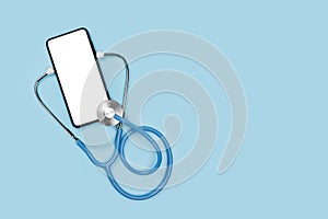 Mockup medical stethoscope and mobile smart phone isolated on blue background. online medicine, doctor online consultation concept