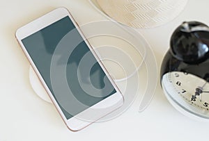 Mockup of mobile phone with wireless charger