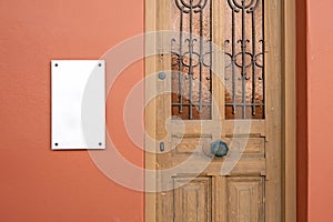 Mockup of outdoor business signboard by the entrance door photo