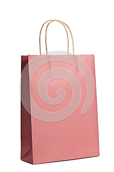 Mockup of paper shopping bag isolated on white background. Packet for gift or present.