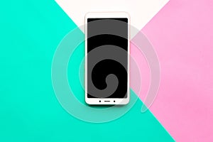 Mockup phone on geometric pink,white and green paper background