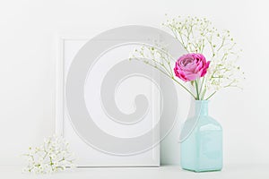 Mockup of picture frame decorated rose flower in vase on white background with clean space for text and design your blogging.