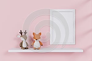 A mockup picture frame with stuffed toy animals.