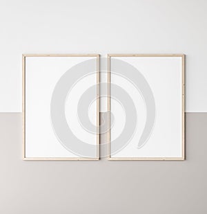 Mockup poster frame, two vertical wooden frames on beige and white wall