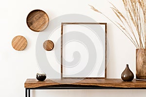 Mockup poster frame and wooden console with interior accessories. photo