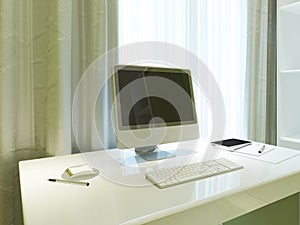 Mockup poster monitor on the desktop in Contemporary interior.