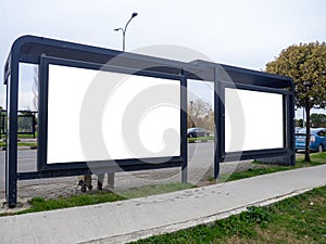 Mockup at a public transport stop. Empty white space for advertising