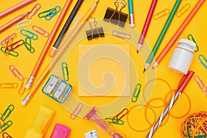 MOCKUP School office supplies on yellow background flat lay copy space