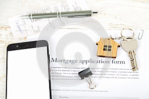 Mockup with smartphone screen and approved mortgage loan agreement application