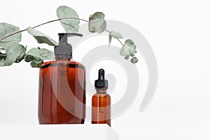 Mockup Spa body cosmetics in brown glass bottles serum with a pipette, oil, gel, shower soap shampoo