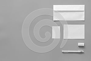 Mockup template for branding identity. White stationery on grey background top view copy space. Pattern