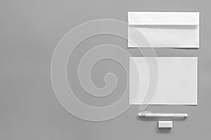 Mockup template for branding identity. White stationery on grey background top view copy space. Pattern