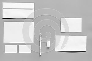 Mockup template for branding identity. White stationery on grey background top view copy space. Pattern