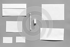 Mockup template for branding identity. White stationery on grey background top view. Pattern