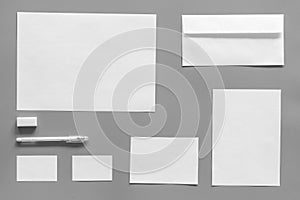 Mockup template for branding identity. White stationery on grey background top view. Pattern