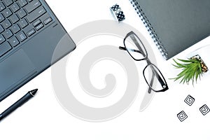 Mockup top view Online home education. Home School with notebook, pen, glasses and laptop with place for text. Remote work and